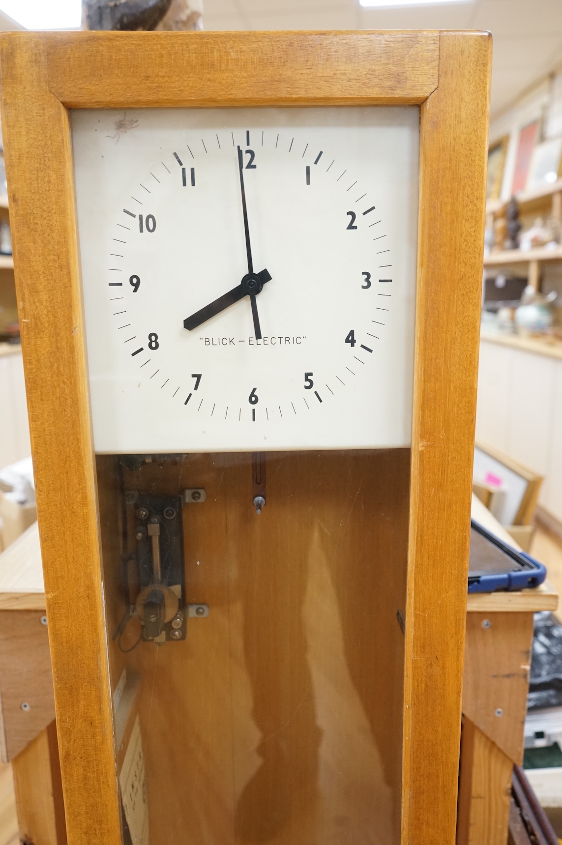 A floor standing Blick-Electric synchrome master clock, 128.5cm high x 29cm wide